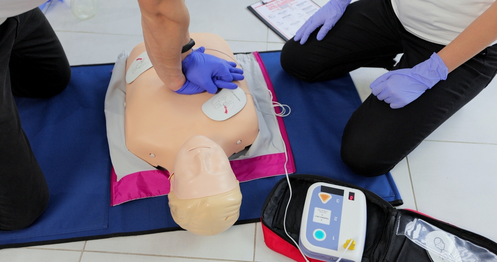 Cpr,Training,Medical,Procedure,Workshop.,Demonstrating,Chest,Compressions,And,Use cpr